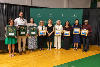 President Amy Storey, center, is flanked by the College’s newest Hall of Fame inductees and Alumni Association Award winners, from left, Maggie Bonafede Gutierrez ’14, Matt Selden ’04, Paige Golden Judge ’14, Cindy Christopher Sechrist ’86, Heidi Nightengale ’83, Dr. Elizabeth “Liz” Mance Duxbury ’03, Dr. Victoria Syracusa ’19 M’20, and Barbara Johnson Williams ’63.